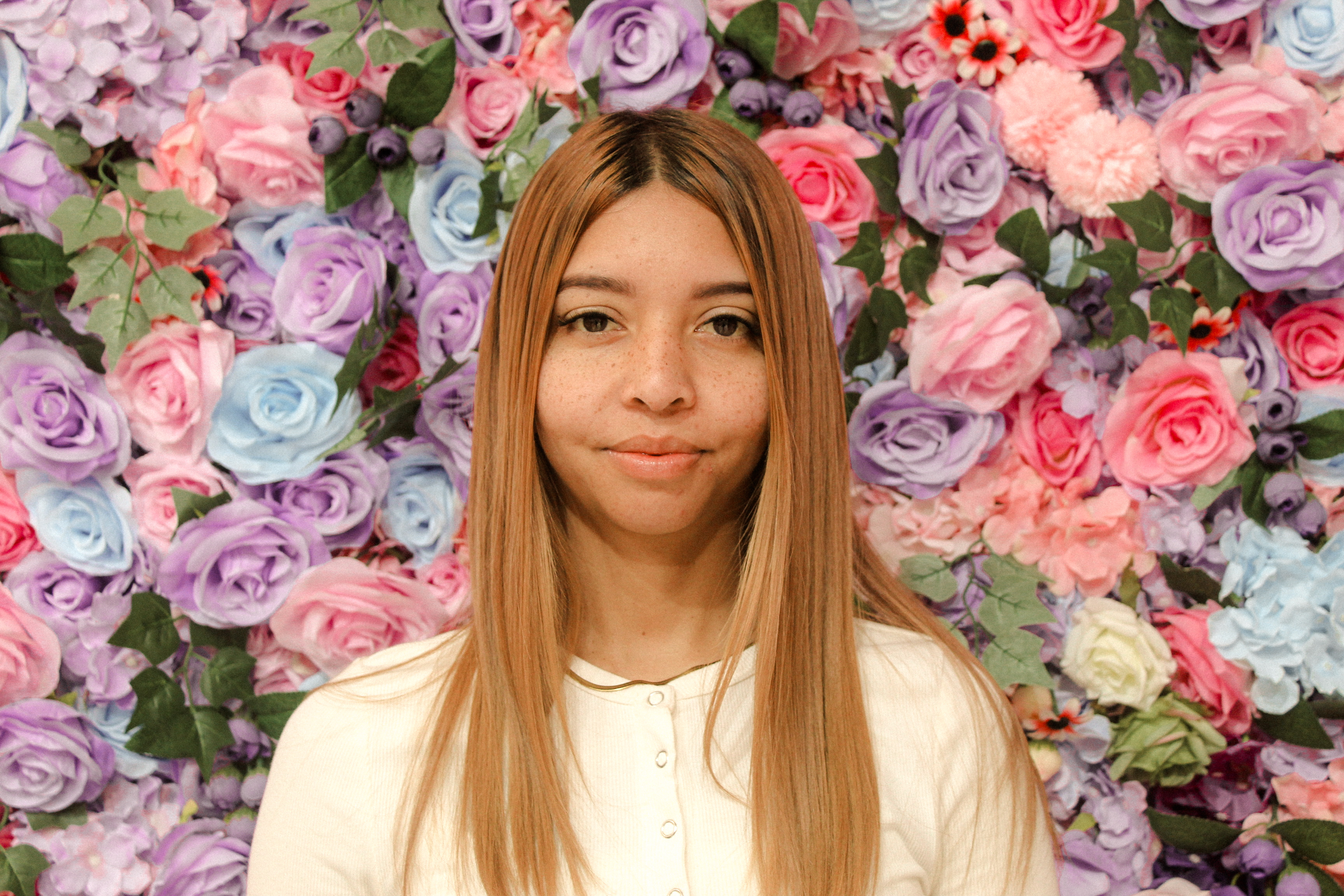 Portrait against a floral backdrop